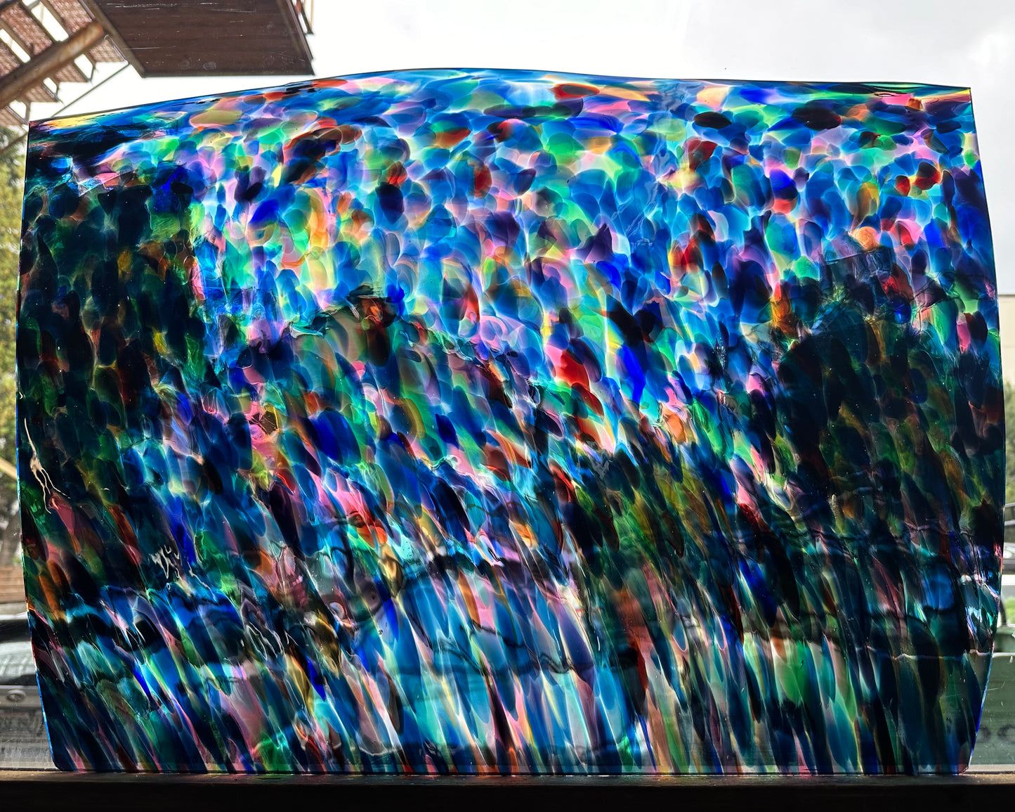 G Multi Multiple colors on clear transparent glass.